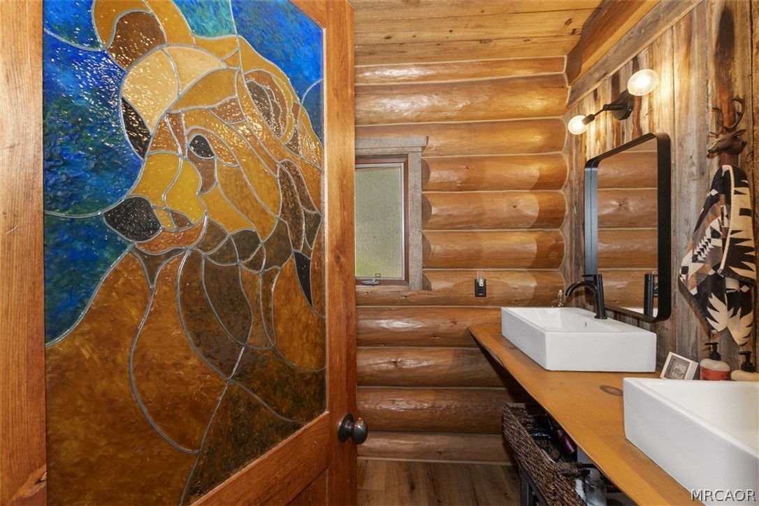 29632 Hook Creek Road Cedar Glen, CA 92321 - Photo 17 of 43 a bathroom with a bathtub and shower