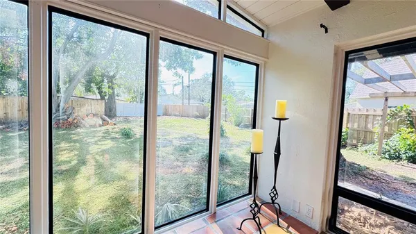 a view of swimming pool from a window