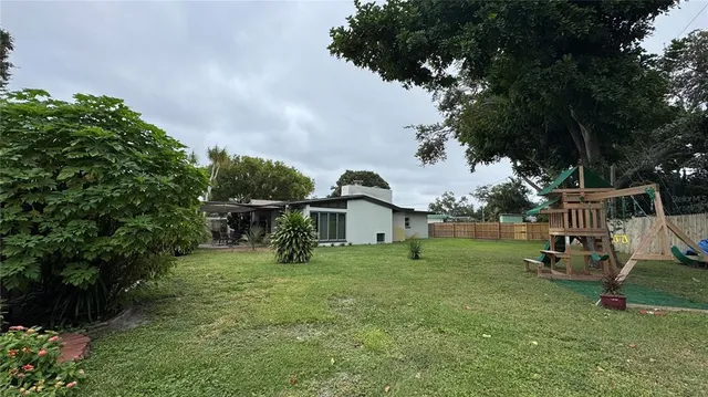 a view of a garden with a slide