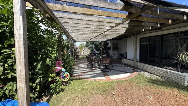 a view of backyard with green space