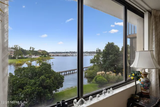 a view of a balcony with dining area