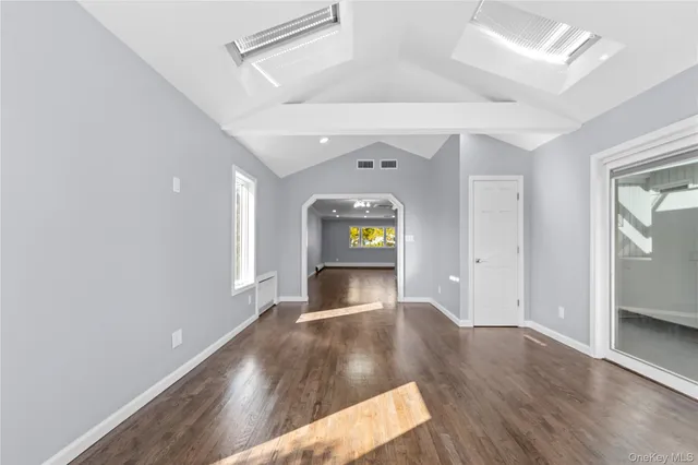 a kitchen with granite countertop cabinets and steel stainless steel appliances