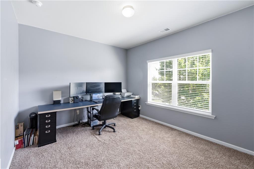 291 Boulder Run Hiram, GA 30141 - Photo 29 of 46 a view of a workspace with furniture and a window