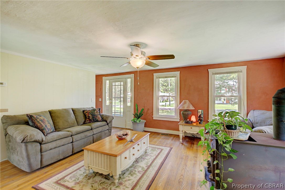 2442 Old Ferry Road Hudgins, VA 23076 - Photo 12 of 33 Living room featuring hardwood / wood-style flooring and ceiling fan