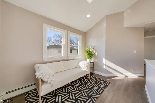 a living room with a rug