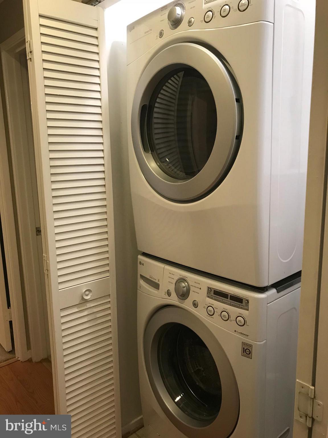 7702 Lexton Place, Unit 65 Springfield, VA 22152 - Photo 14 of 24 a close up view of a washer and dryer