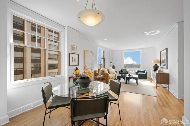 a kitchen with a stove and a white cabinets