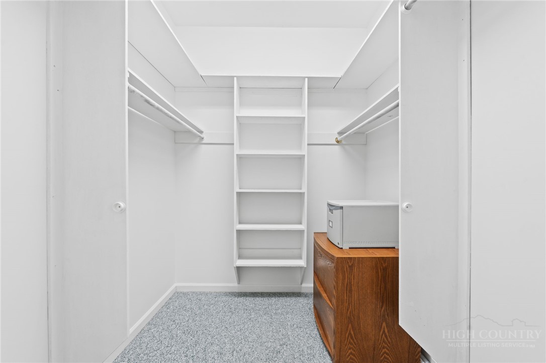 480 North Ridge Circle Boone, NC 28607 - Photo 21 of 50 a view of walk in closet with empty racks
