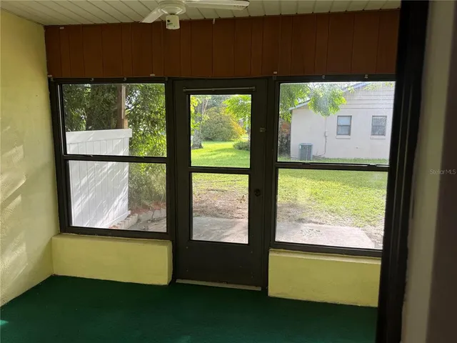 a view of swimming pool from a window