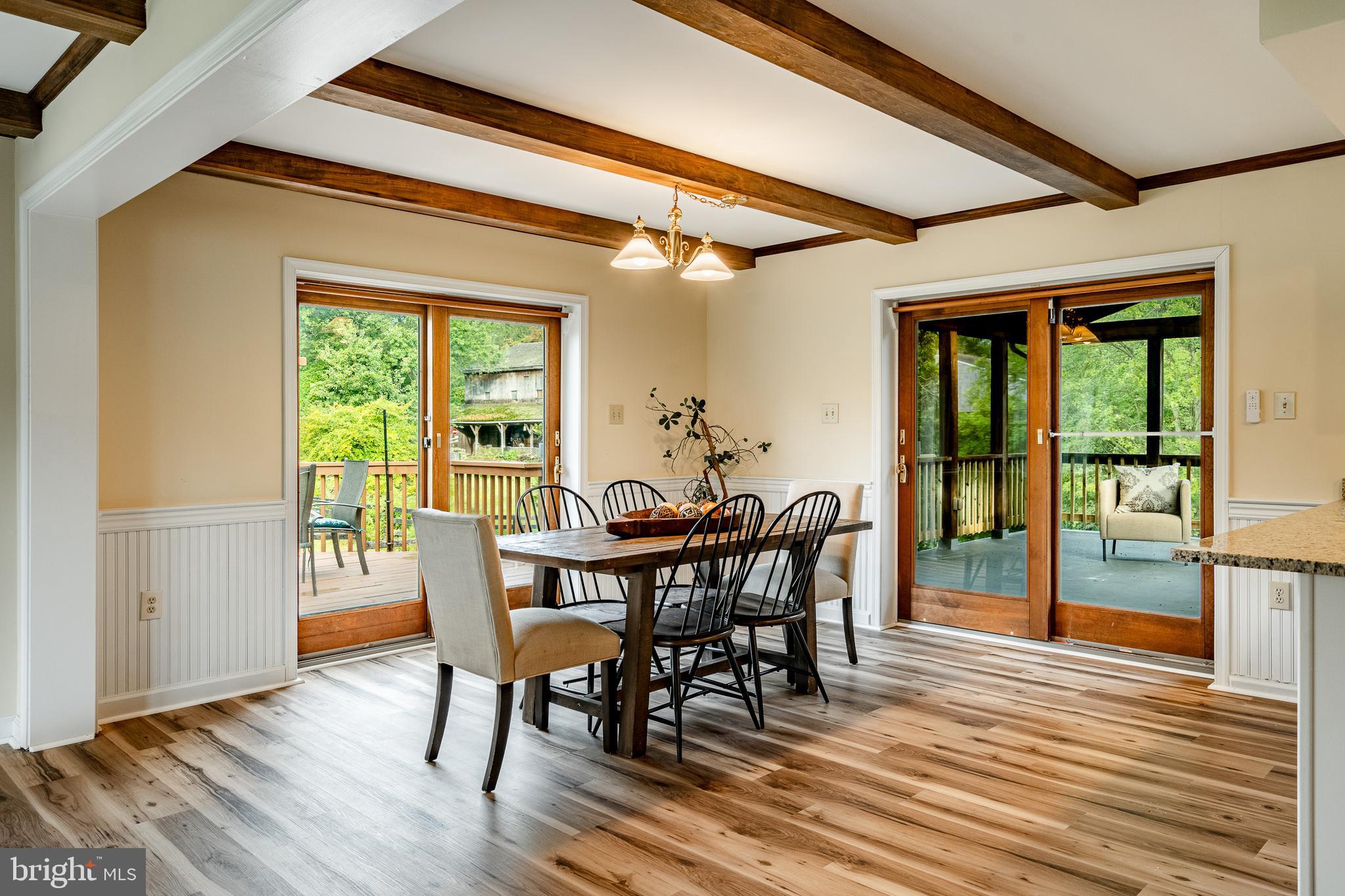 249 Mattson Road Garnet Valley, PA 19060 - Photo 11 of 53 a view of a dining room with furniture window and wooden floor