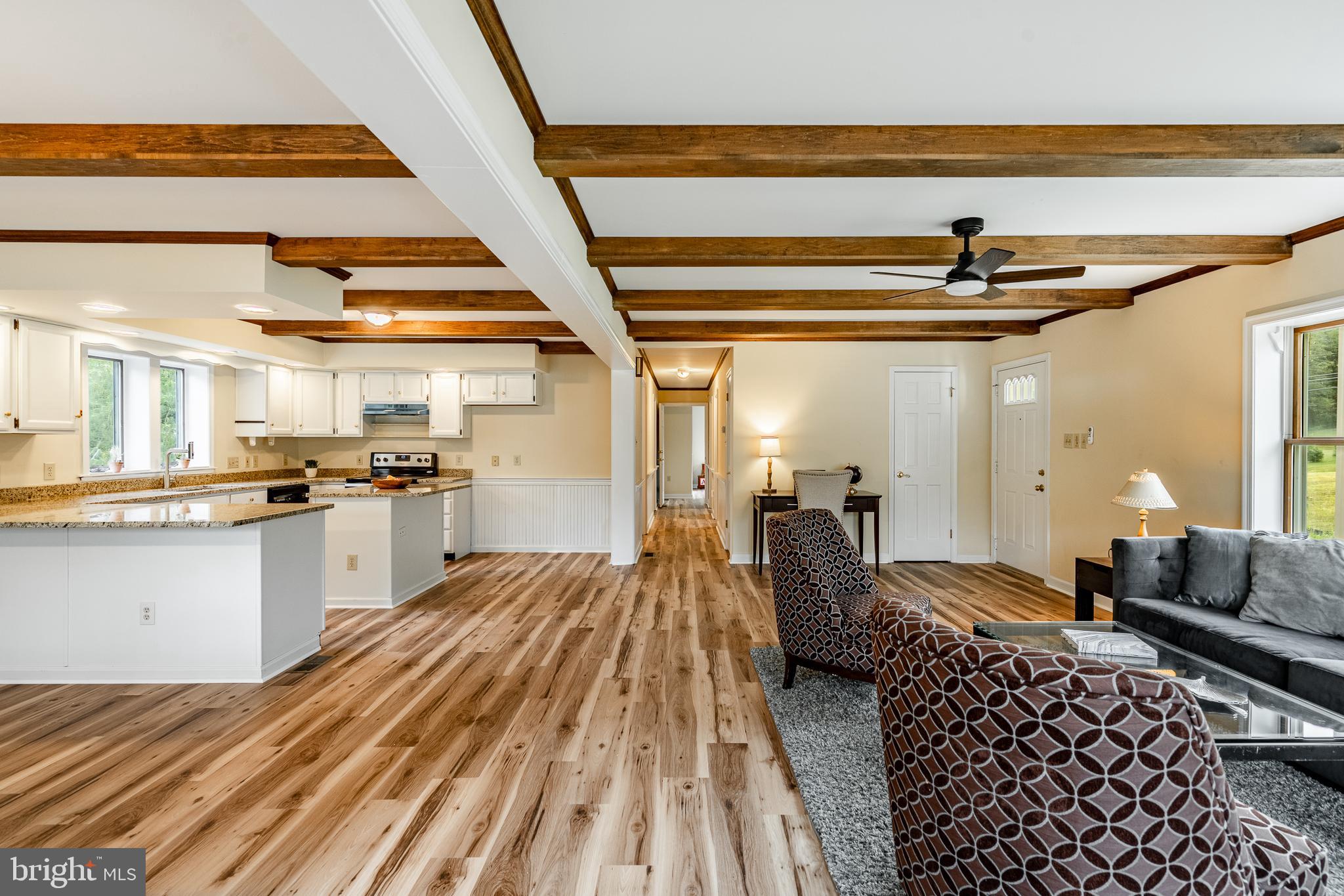249 Mattson Road Garnet Valley, PA 19060 - Photo 14 of 53 a living room with a couch and a table