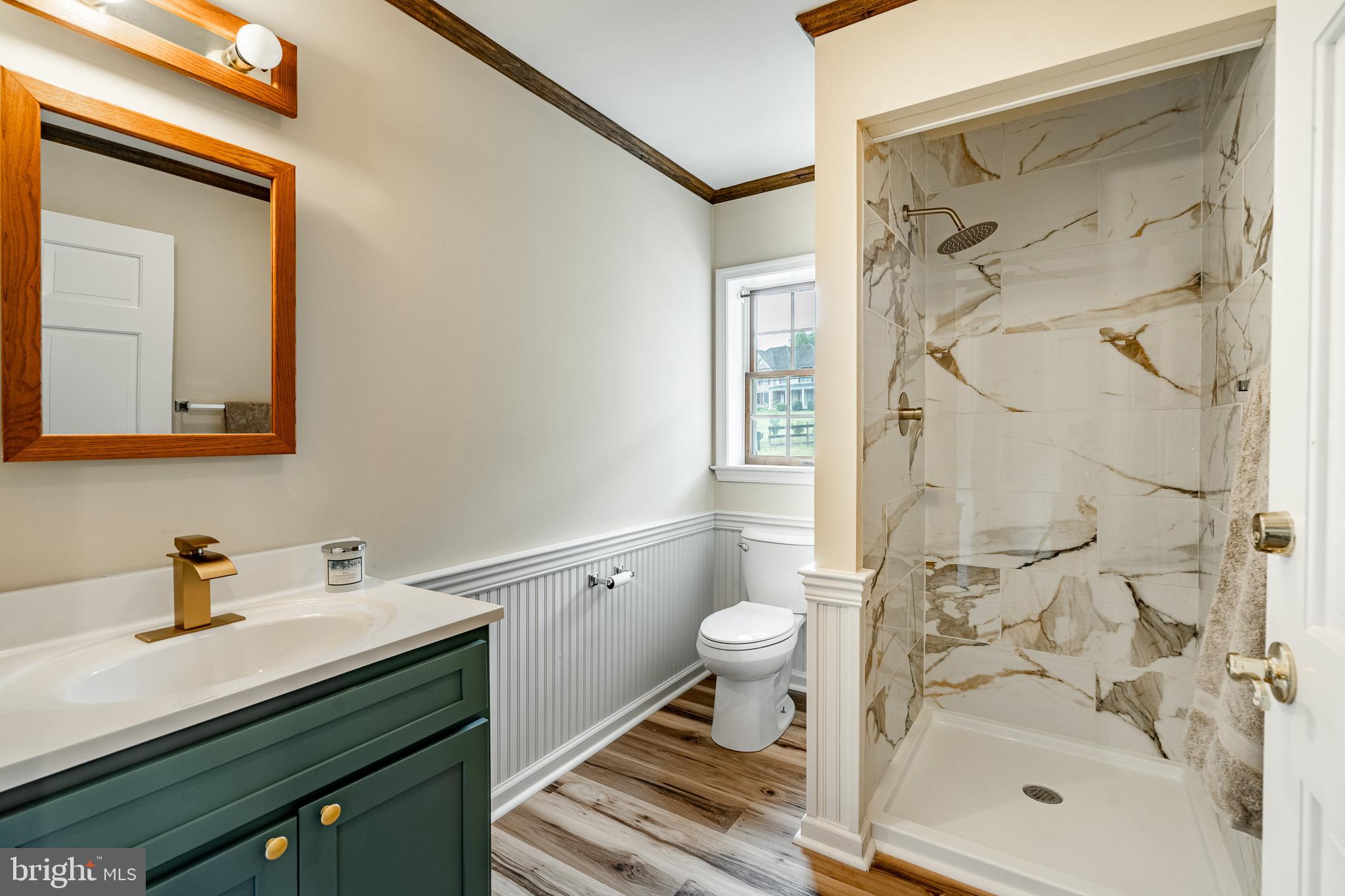 249 Mattson Road Garnet Valley, PA 19060 - Photo 23 of 53 a bathroom with a sink shower and a mirror