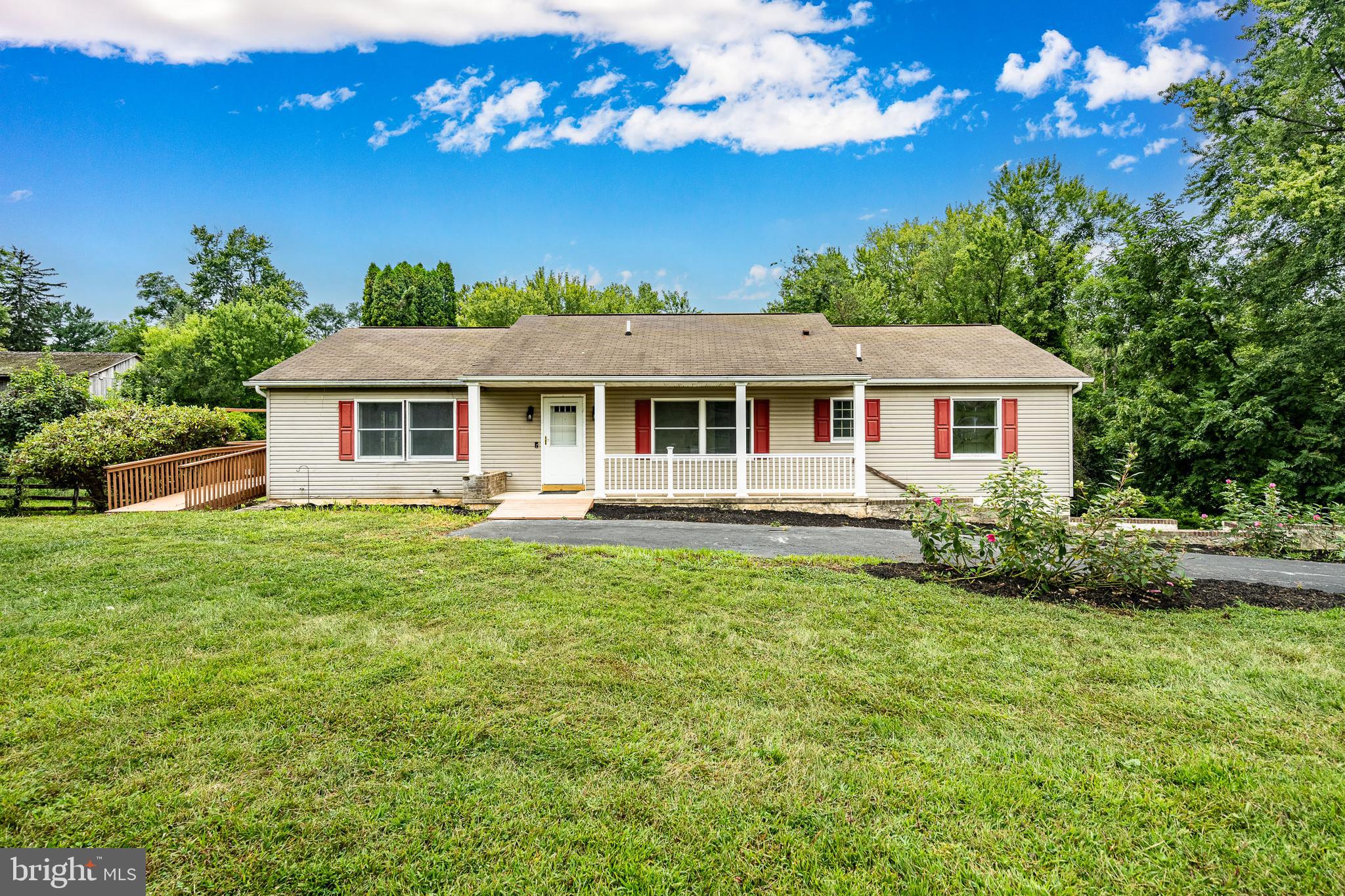 249 Mattson Road Garnet Valley, PA 19060 - Photo 3 of 53 a front view of a house with a garden