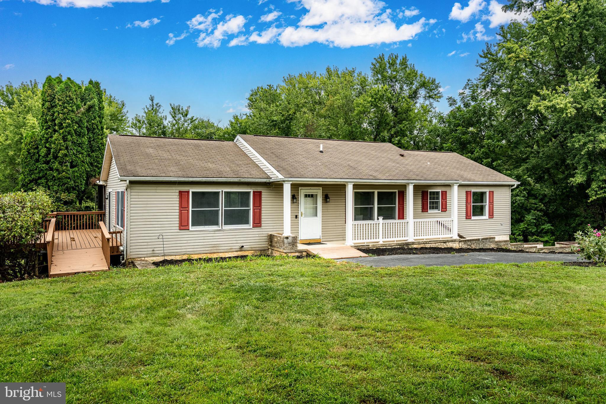 249 Mattson Road Garnet Valley, PA 19060 - Photo 4 of 53 a view of a house with a yard and sitting area