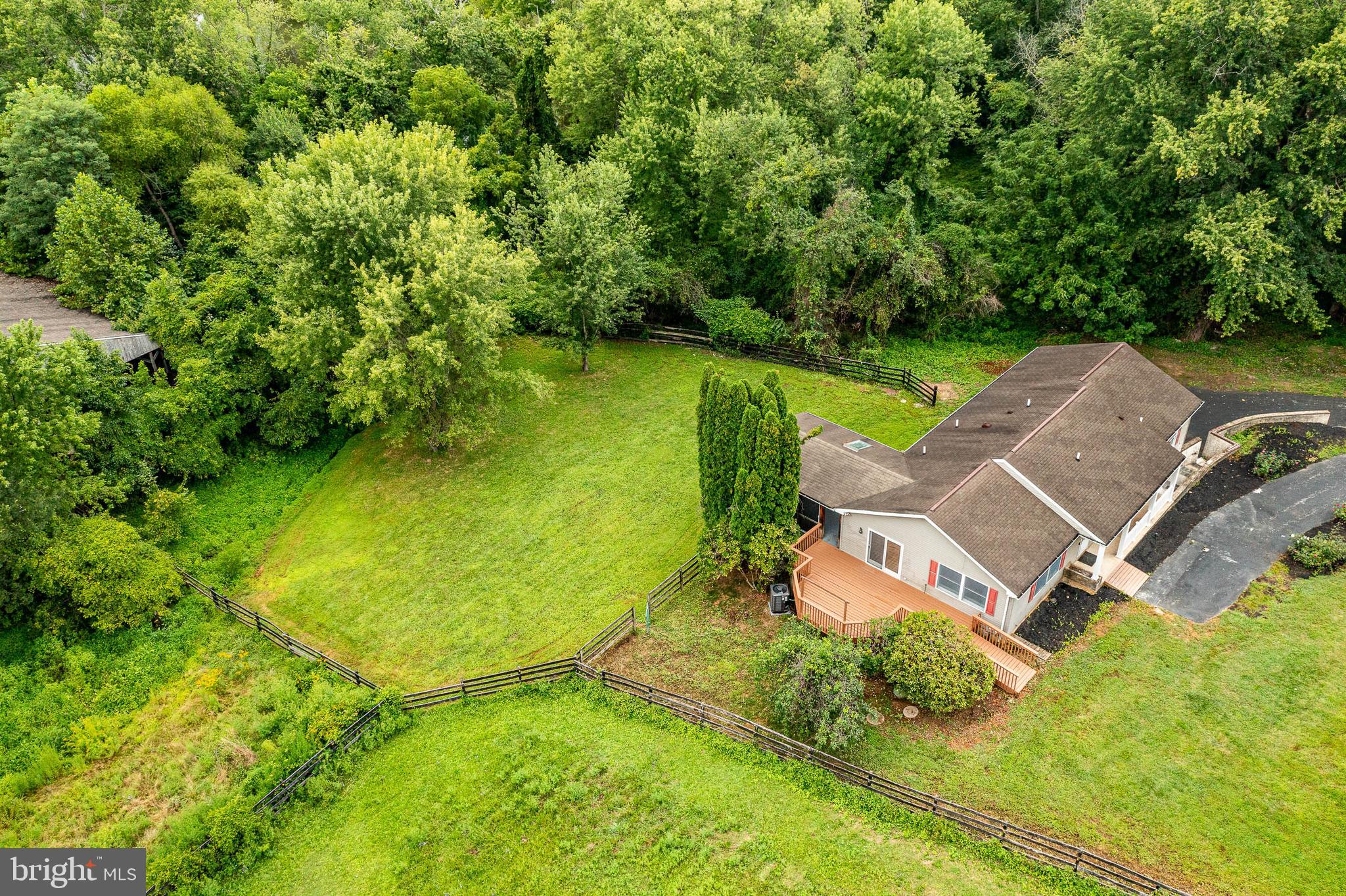 249 Mattson Road Garnet Valley, PA 19060 - Photo 42 of 53 an aerial view of a house with swimming pool and garden
