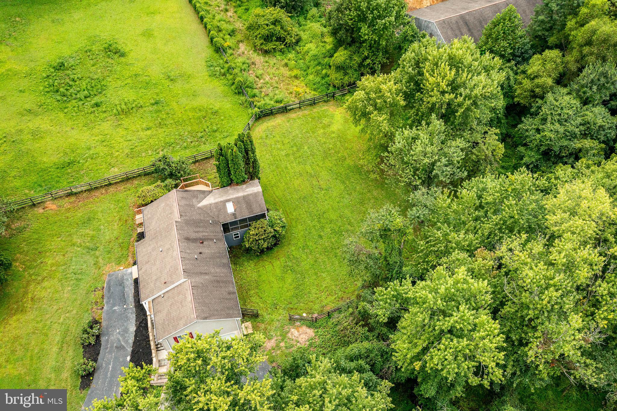 249 Mattson Road Garnet Valley, PA 19060 - Photo 45 of 53 a view of a yard with a house in the background