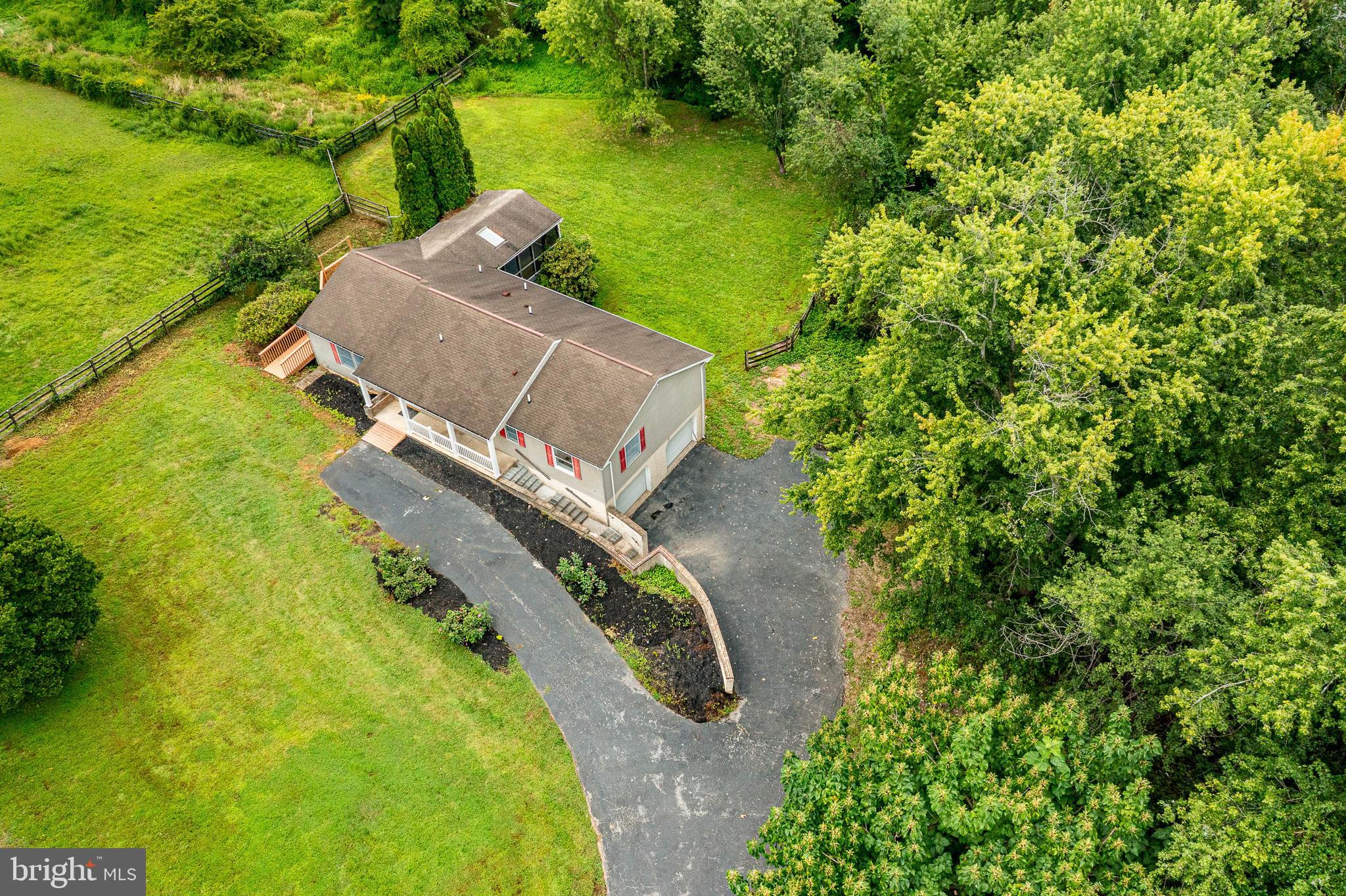 249 Mattson Road Garnet Valley, PA 19060 - Photo 46 of 53 a view of a house with a yard and lake