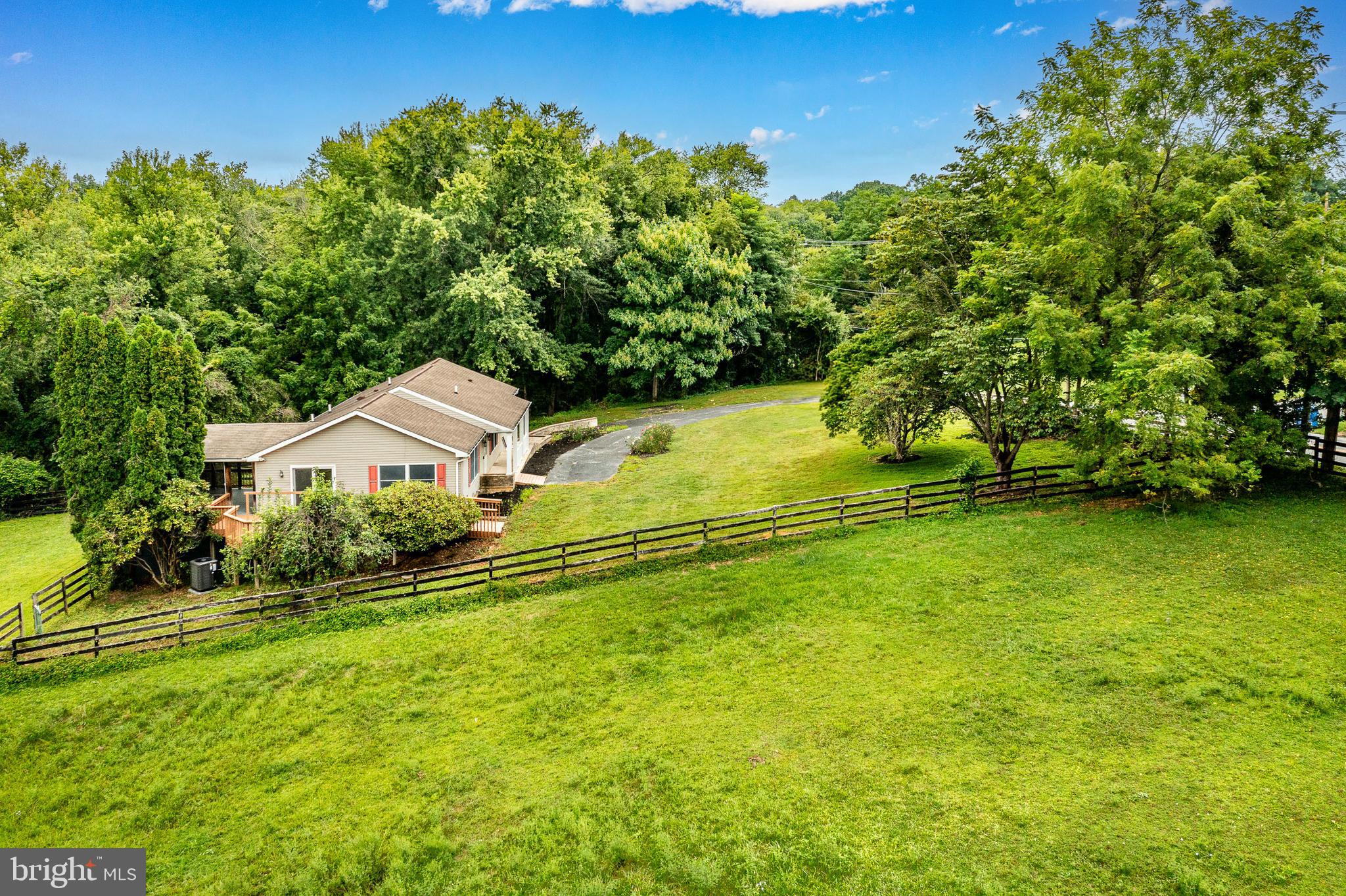 249 Mattson Road Garnet Valley, PA 19060 - Photo 49 of 53 a view of a house with a yard