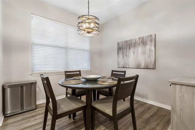 a bedroom with a bed and a flat screen tv in it