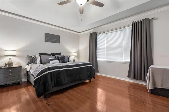 a bathroom with a shower sink and mirror