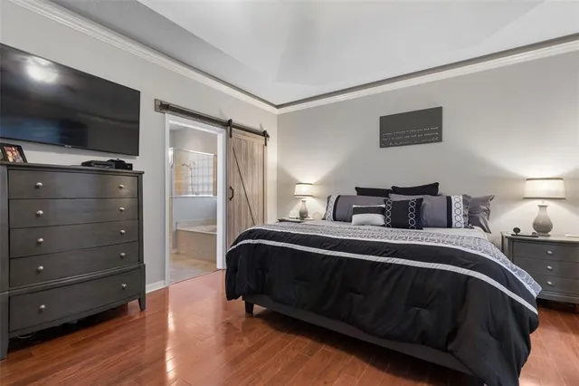 a bathroom with a double vanity sink and mirror
