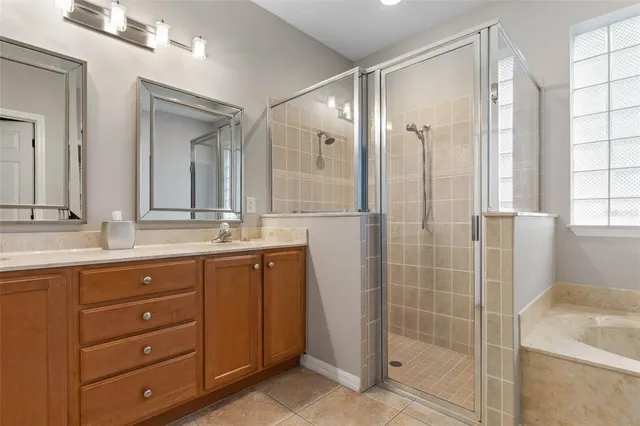 a bath tub sitting next to a window