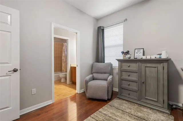 a bathroom with a bathtub and toilet