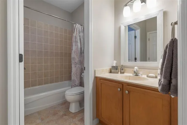 a view of a workspace with furniture and wooden floor