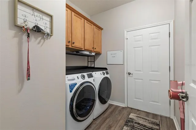 a view of a backyard with sitting area