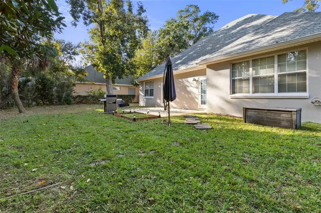 a front view of a house with garden and porch
