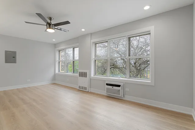 a view of an empty room with a window