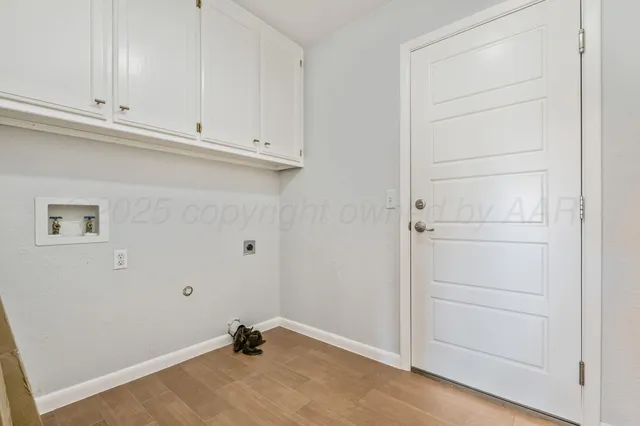a view of a closet with cabinet