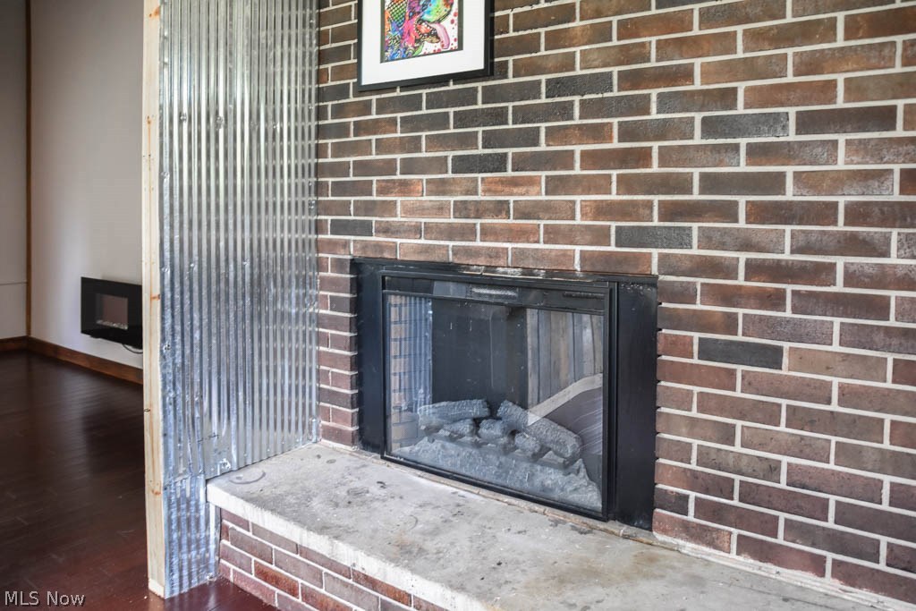 3703 Johnson Road Norton, OH 44203 - Photo 10 of 24 Great room fireplace!