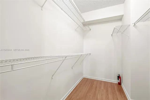 a view of a room with racks on the wall