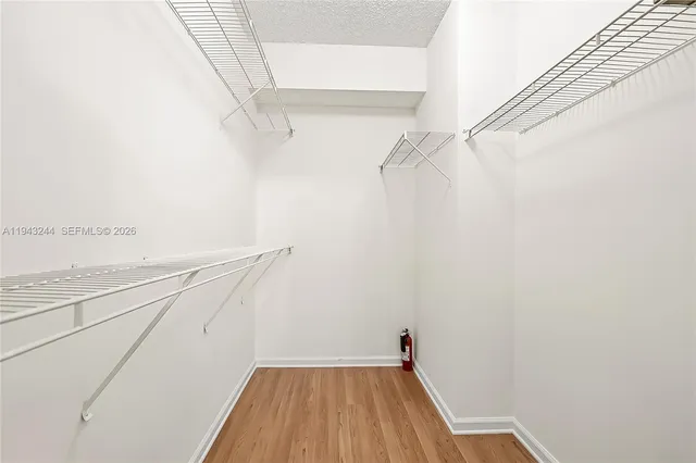 a view of a room with racks on the wall