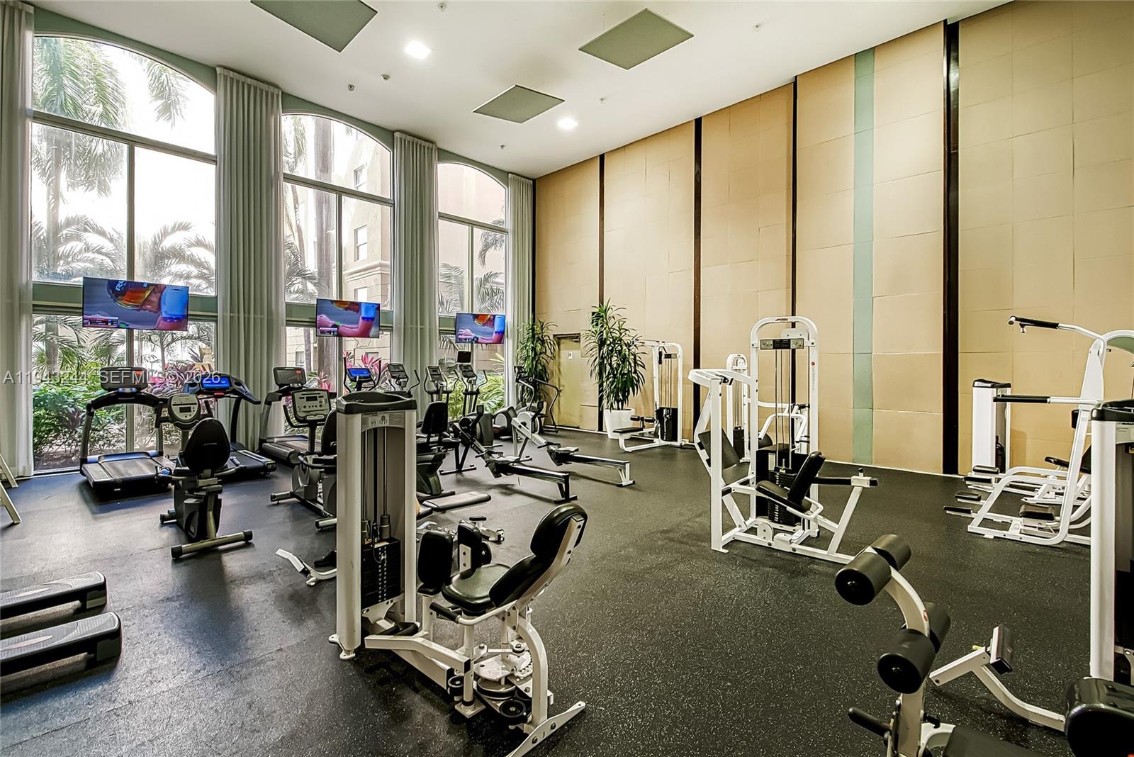 17150 North Bay Road, Unit 2301 Sunny Isles Beach, FL 33160 - Photo 26 of 44 a view of a room with gym equipment