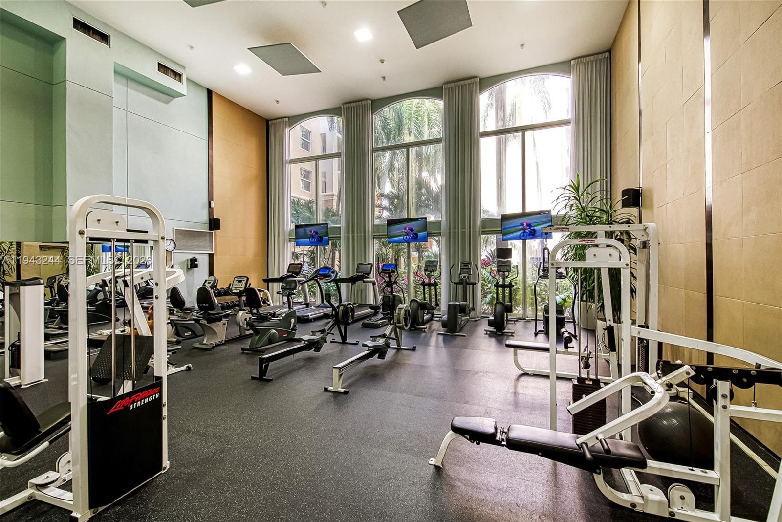 17150 North Bay Road, Unit 2301 Sunny Isles Beach, FL 33160 - Photo 27 of 44 a view of a room with gym equipment