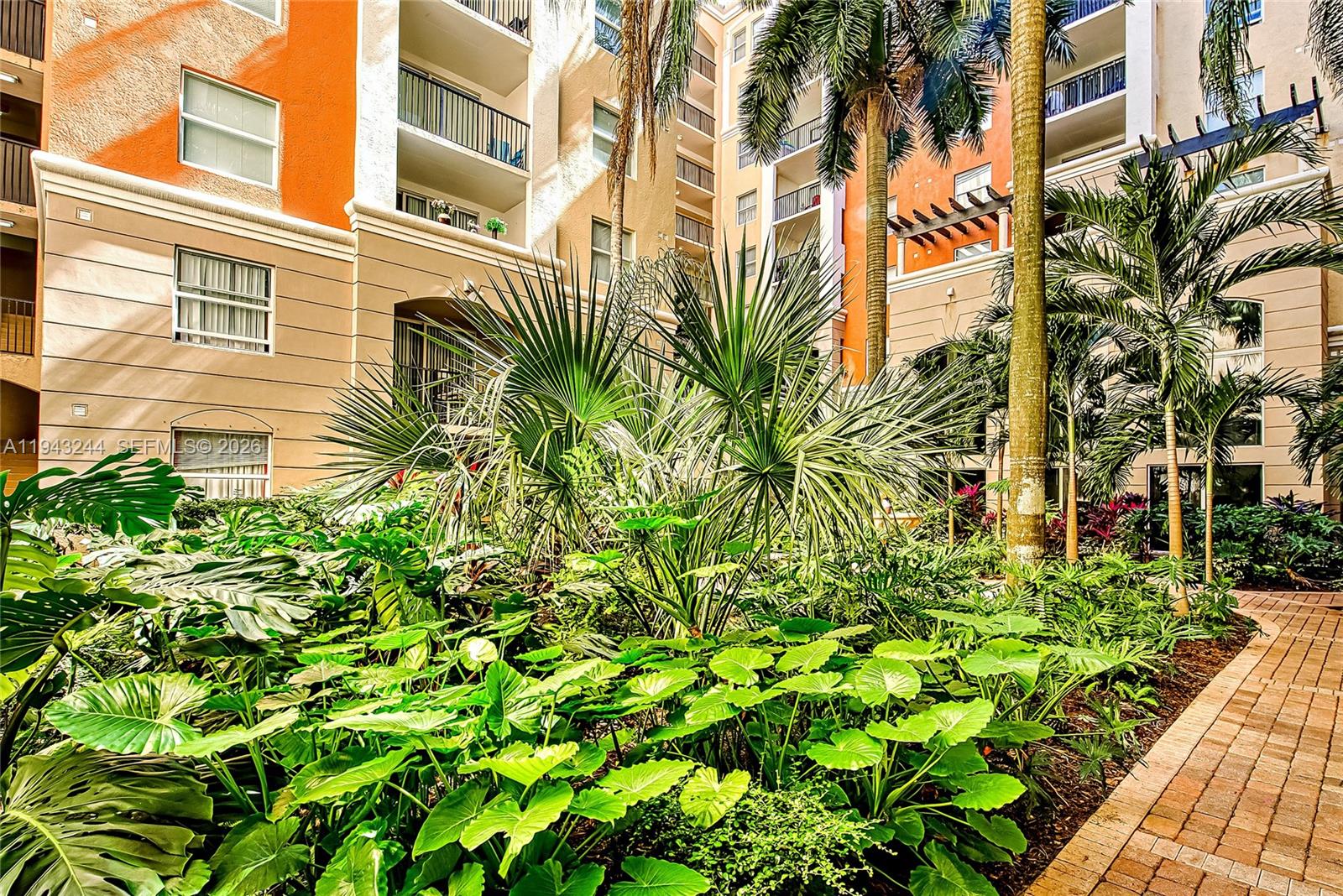 17150 North Bay Road, Unit 2301 Sunny Isles Beach, FL 33160 - Photo 33 of 44 a plant that is in front of a building