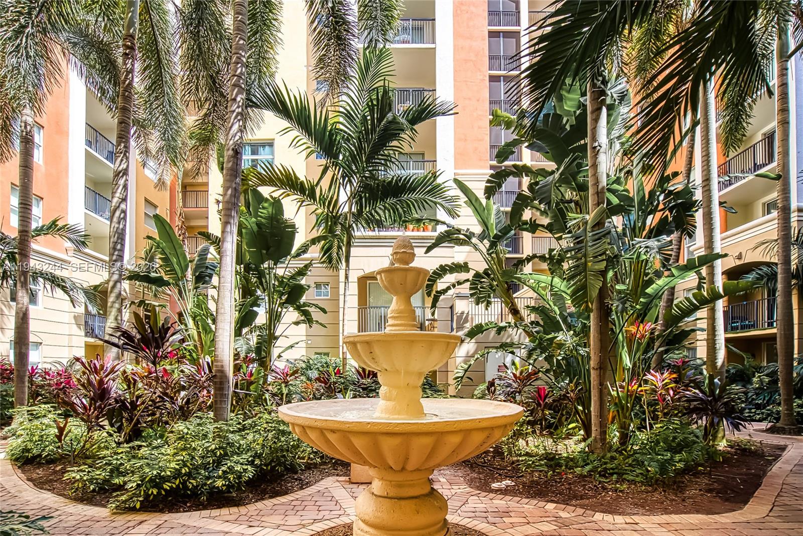 17150 North Bay Road, Unit 2301 Sunny Isles Beach, FL 33160 - Photo 34 of 44 a view of a fountain in the front of a building