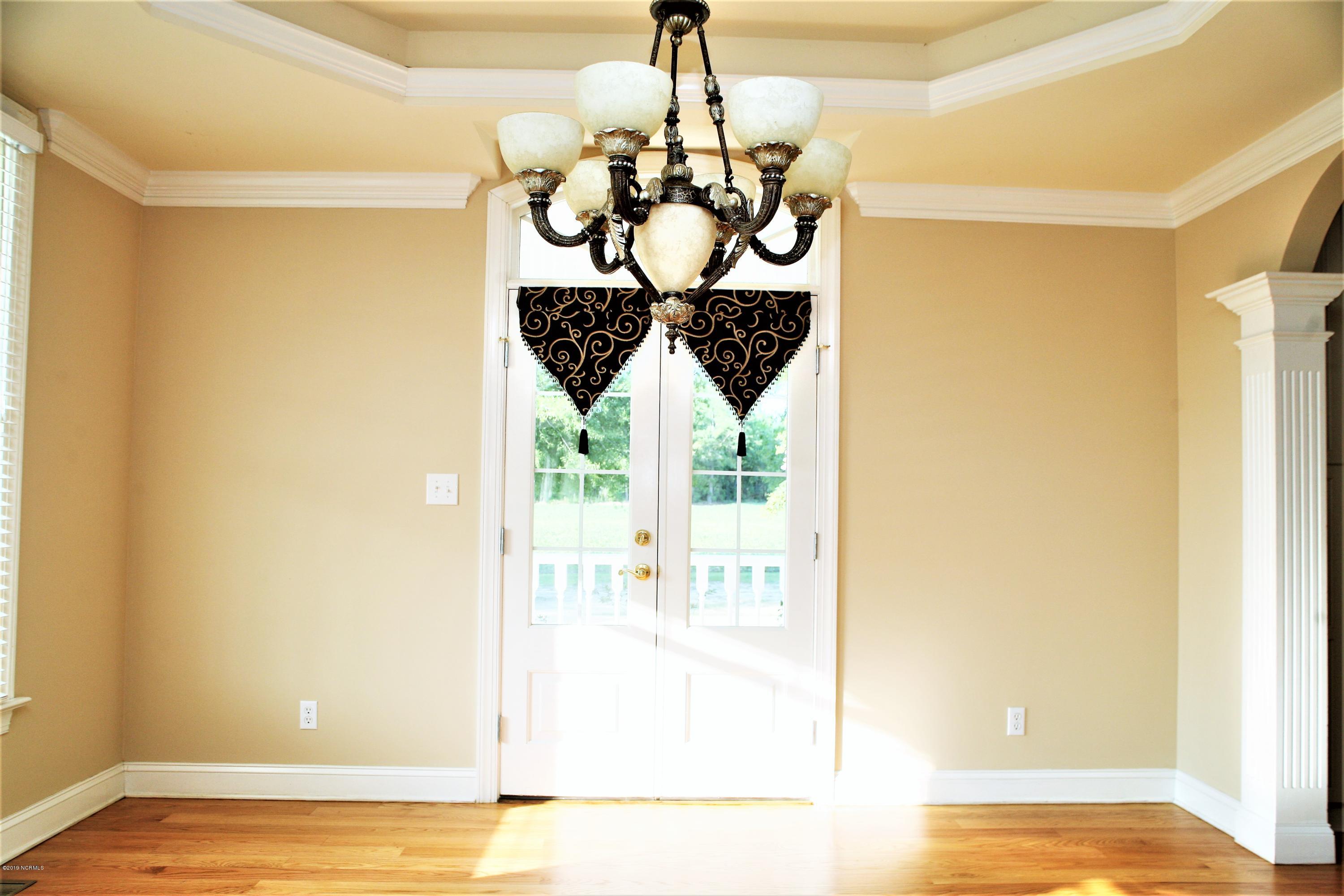1768 Greens Bridge Road Garland, NC 28441 - Photo 14 of 59 Dining with Tray Ceiling