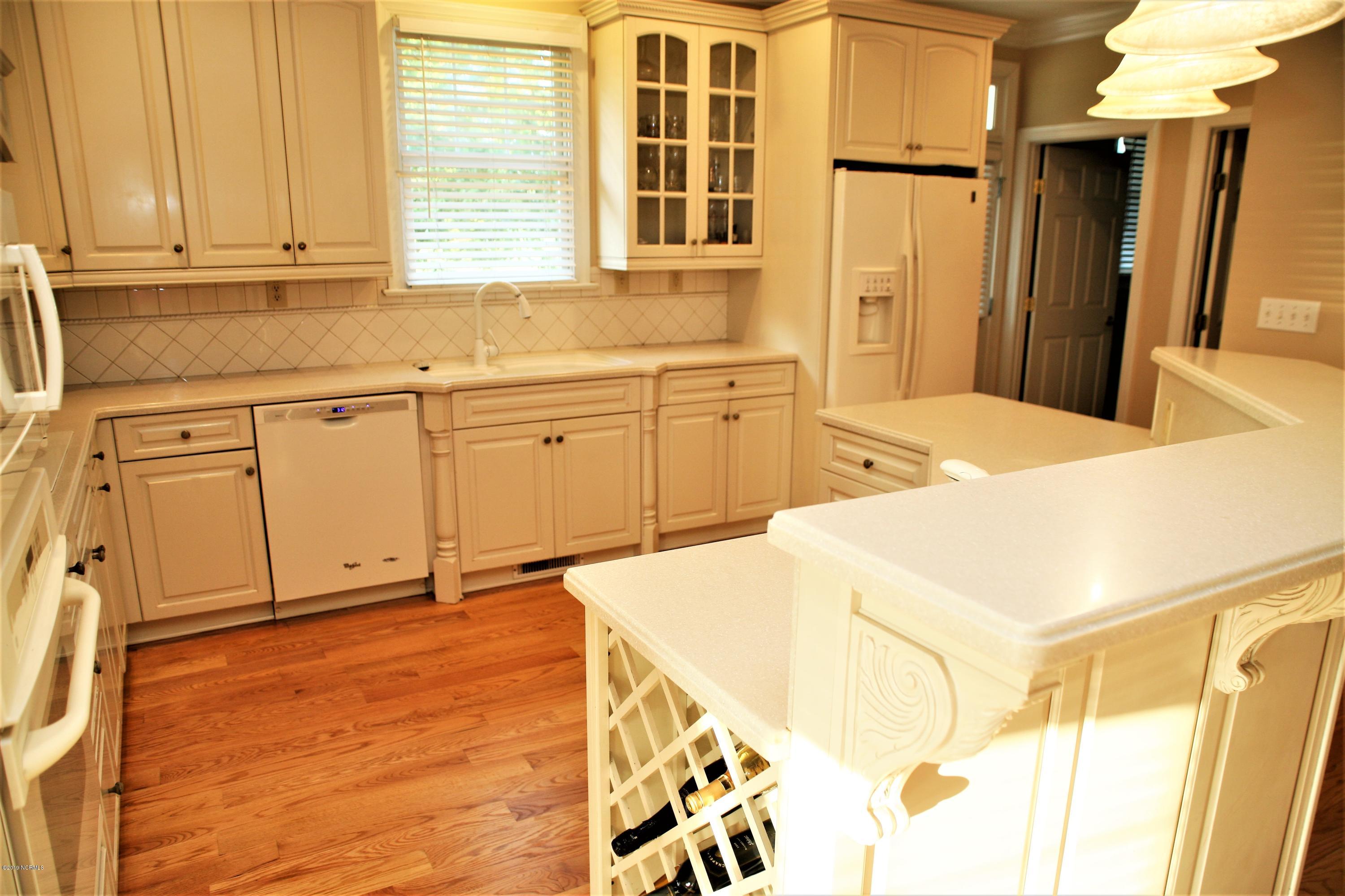 1768 Greens Bridge Road Garland, NC 28441 - Photo 18 of 59 Kitchen with Built In Wine Rack