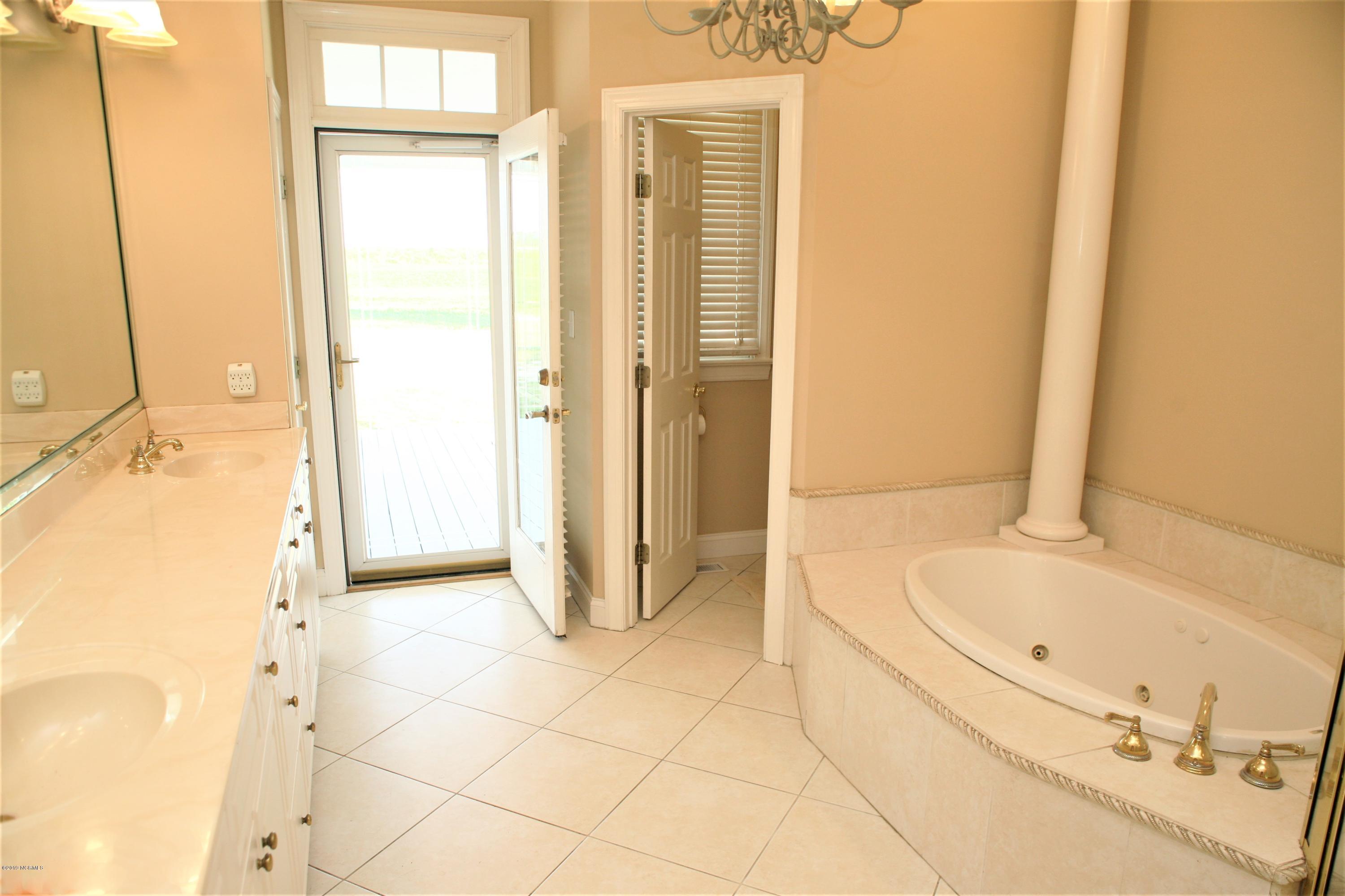 1768 Greens Bridge Road Garland, NC 28441 - Photo 32 of 59 Master Bath with Rear Porch Private Access