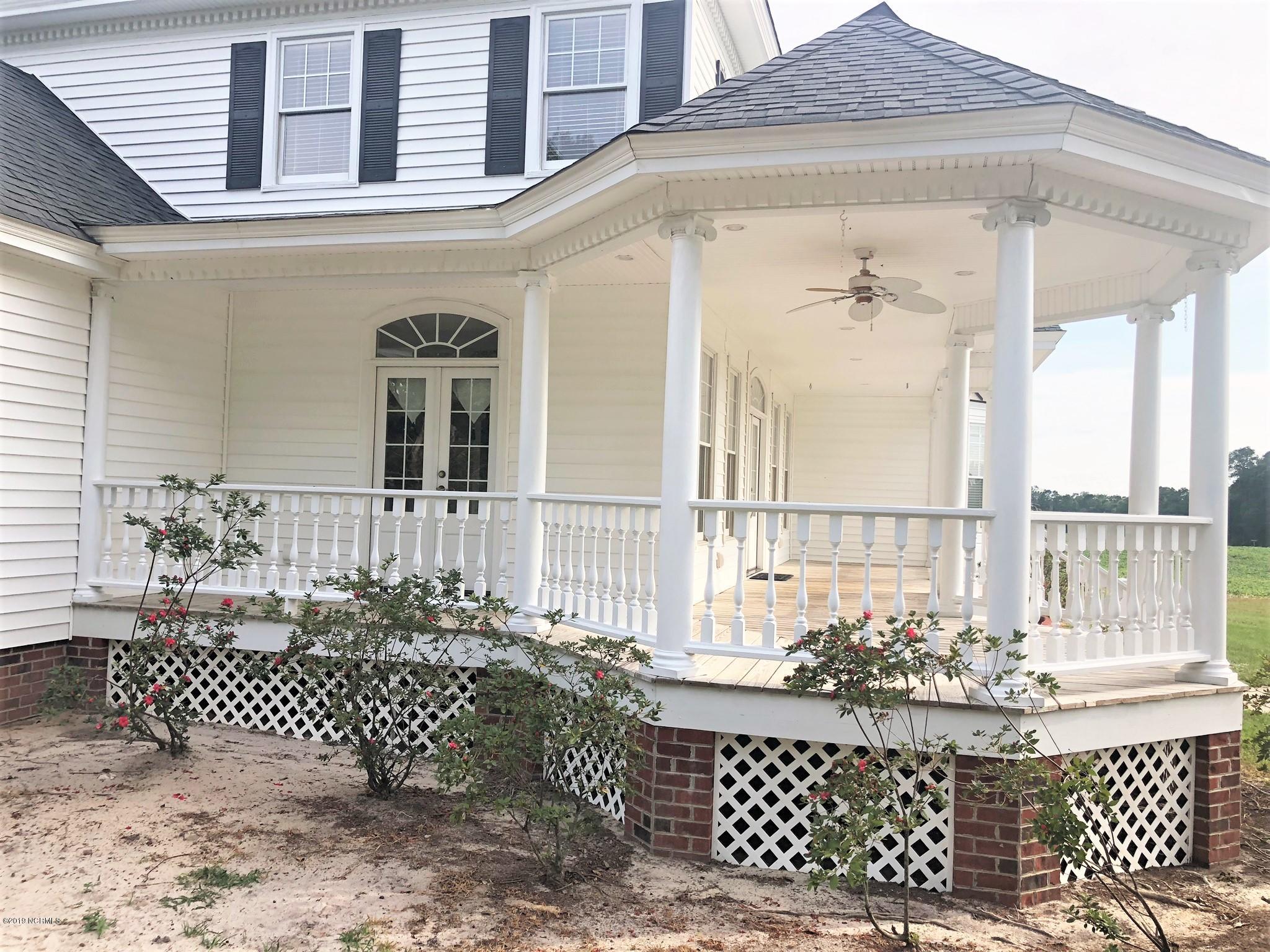 1768 Greens Bridge Road Garland, NC 28441 - Photo 54 of 59 Wrap Around Porch