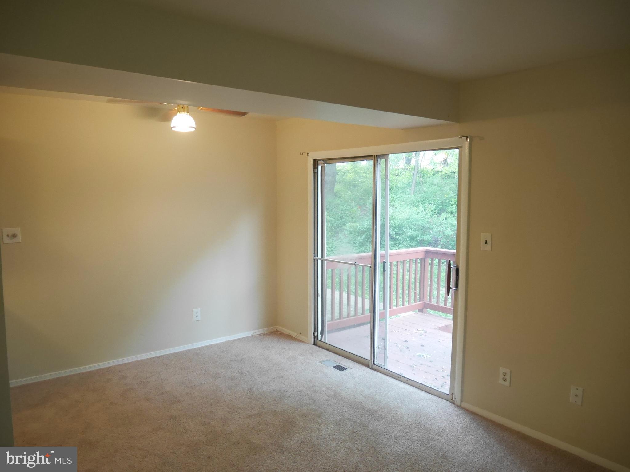 66 Ridgelawn Road, Unit A Reisterstown, MD 21136 - Photo 3 of 17 Dining Room/ Side Door to Deck