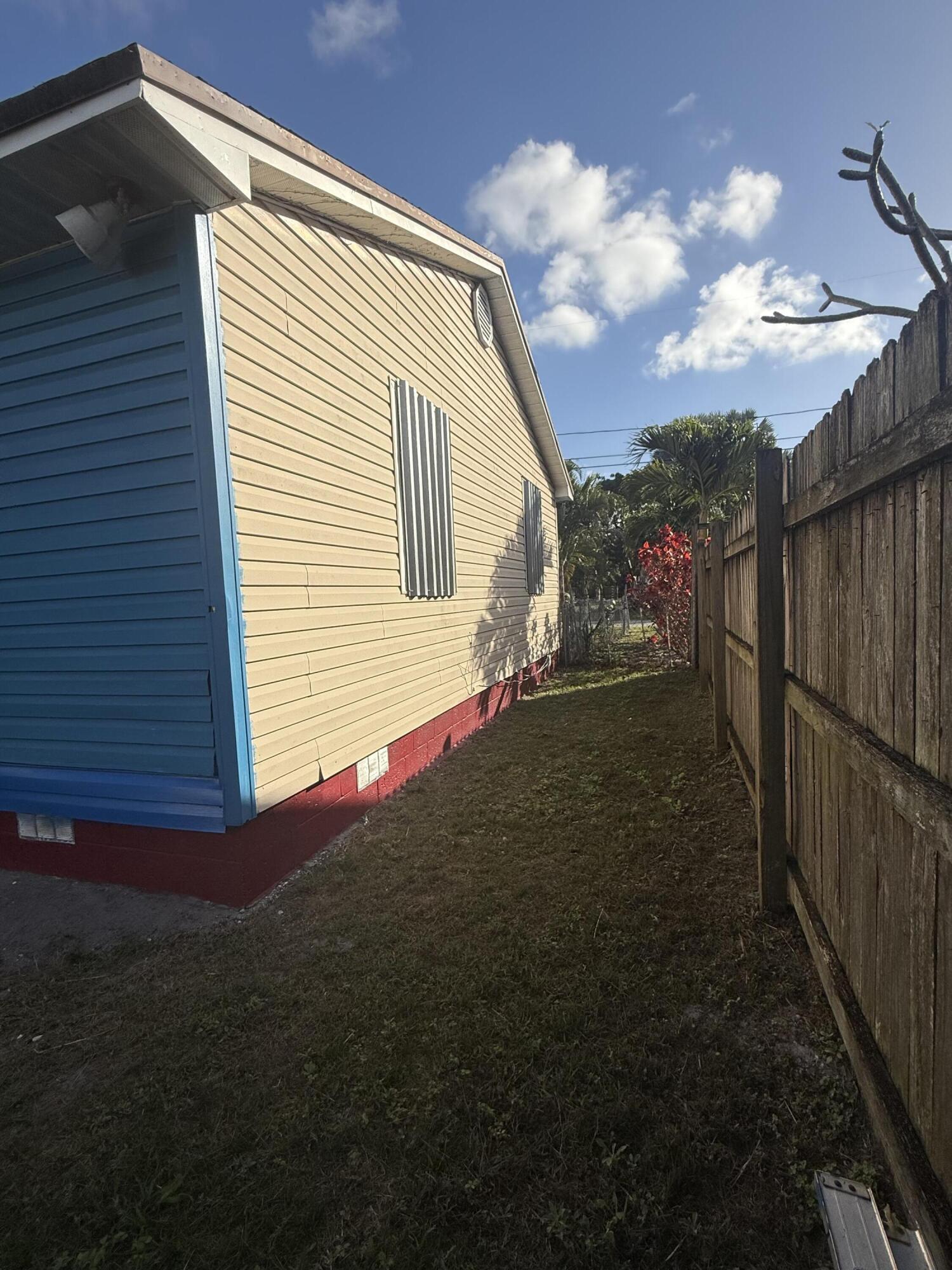 1203 Mathis Street Lake Worth, FL 33461 - Photo 19 of 19 a view of back yard of the house