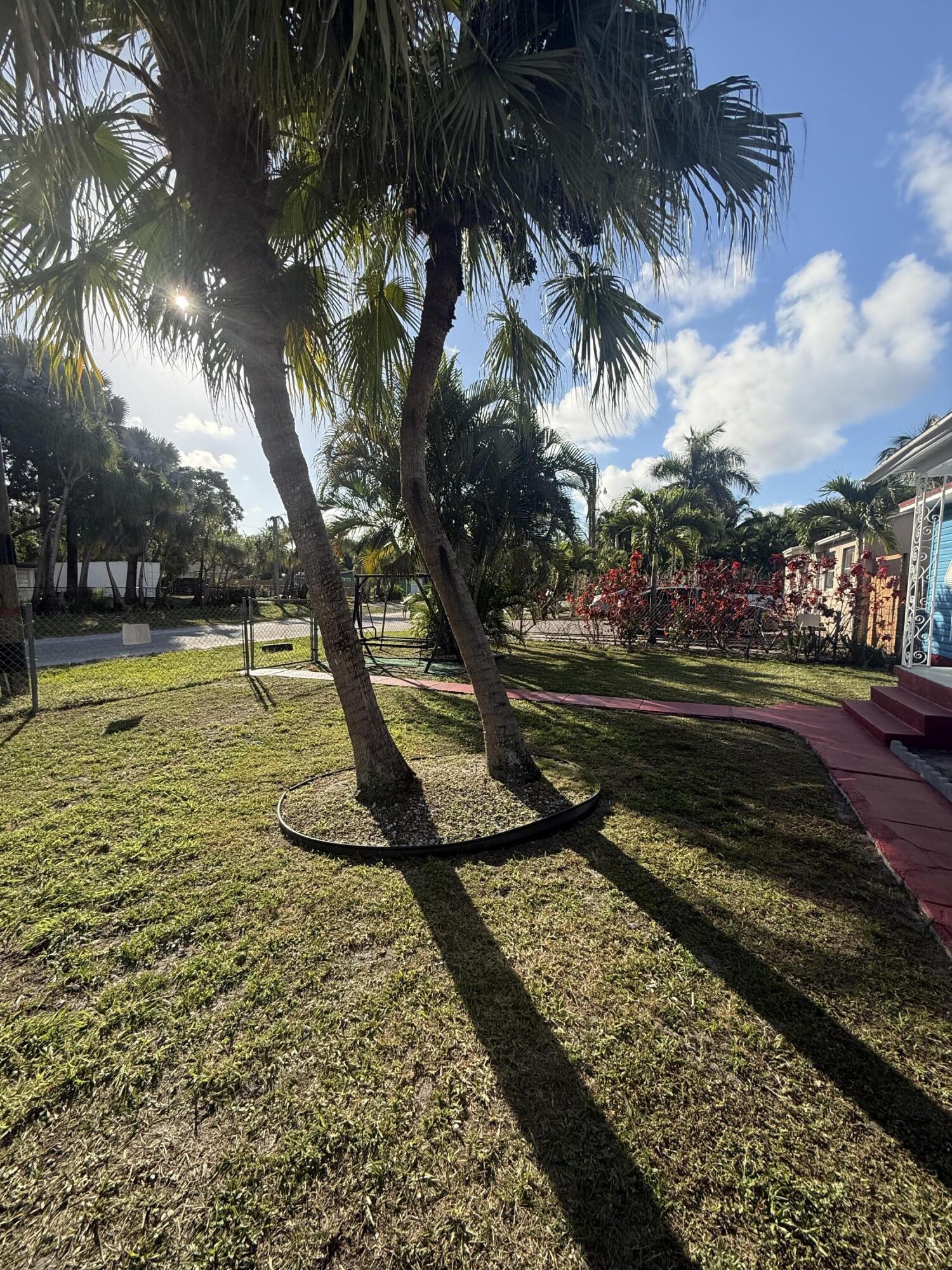 1203 Mathis Street Lake Worth, FL 33461 - Photo 4 of 19 a view of a yard with plants