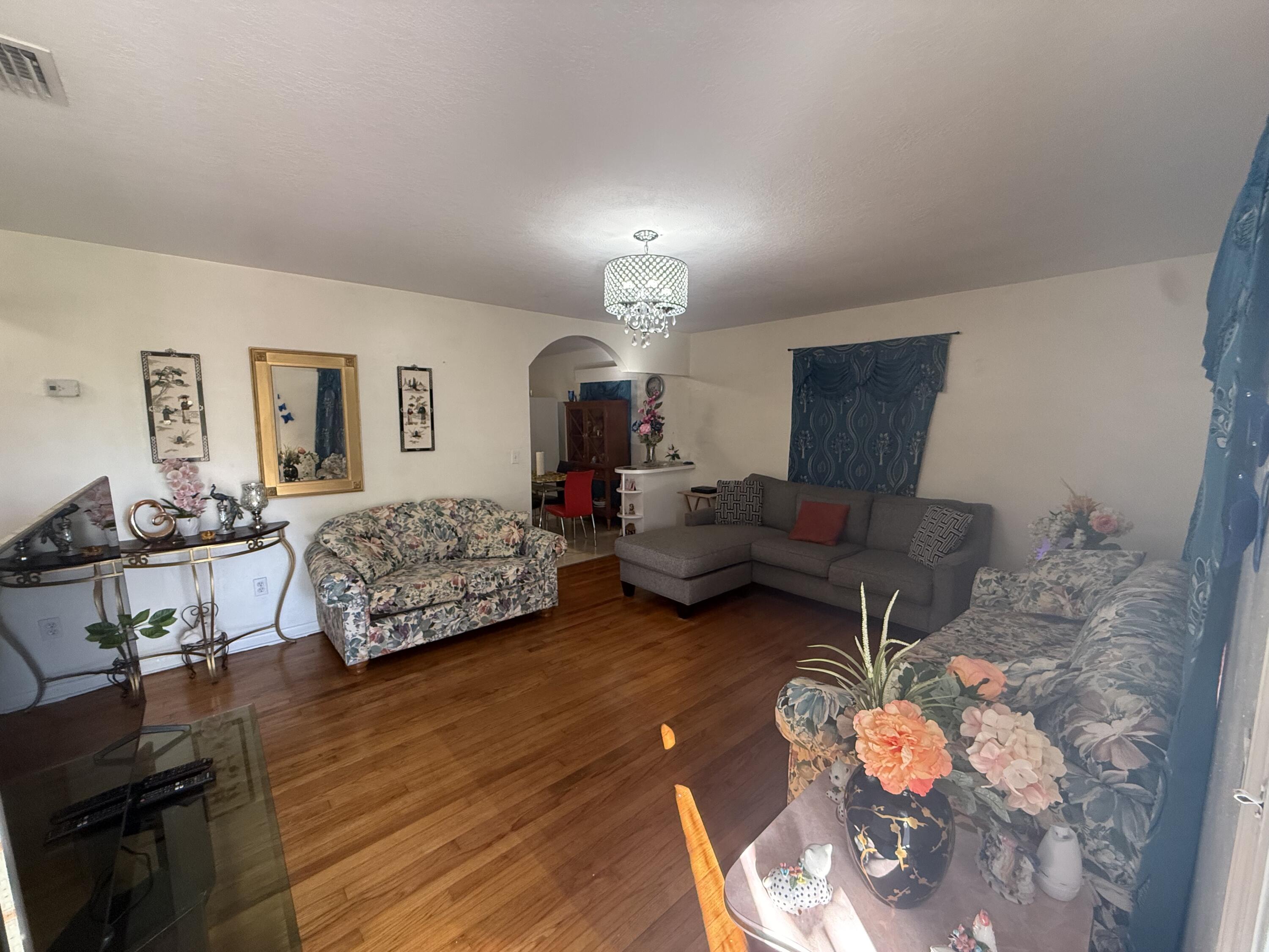 1203 Mathis Street Lake Worth, FL 33461 - Photo 6 of 19 a living room with furniture and wooden floor