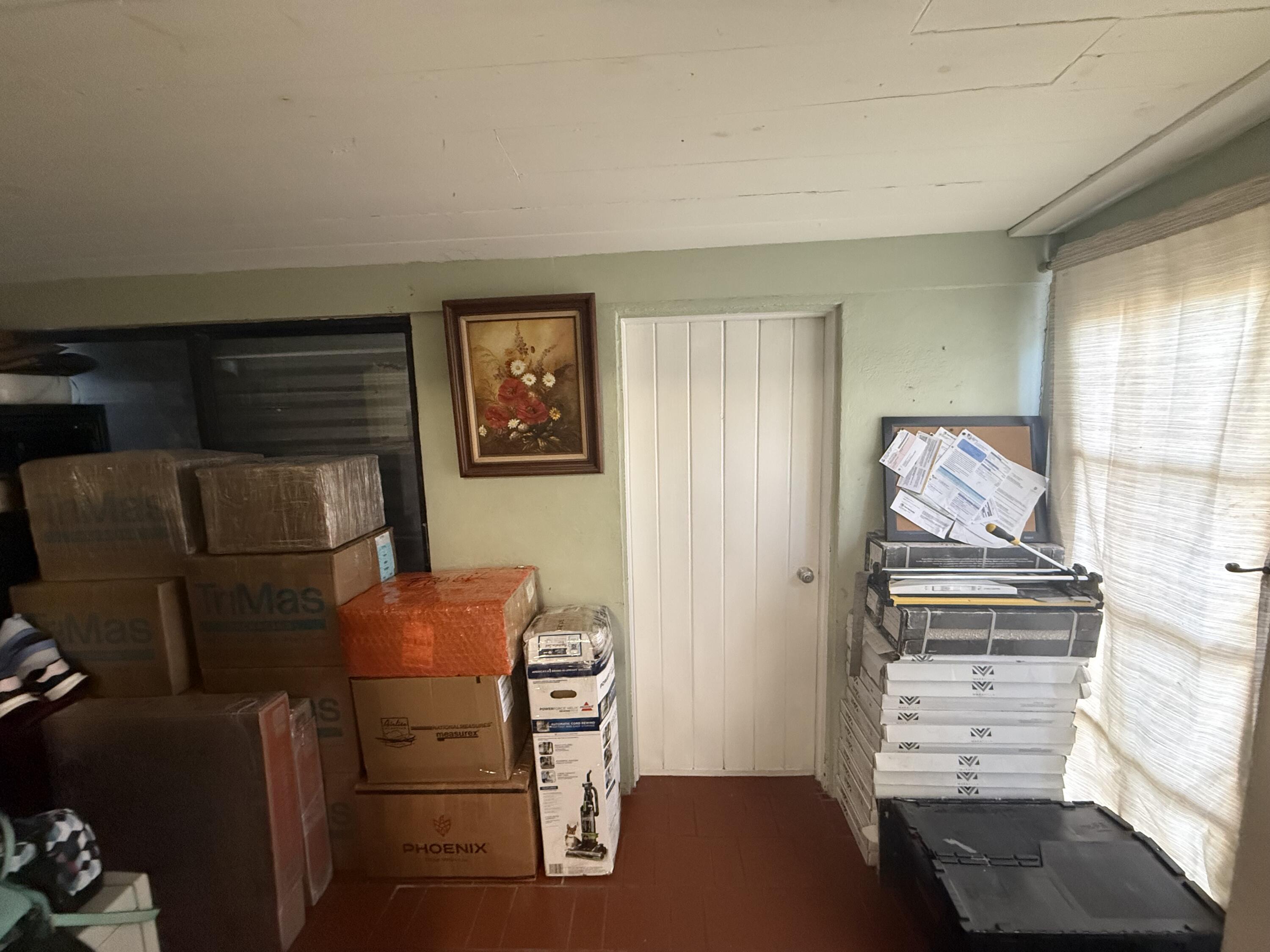 1203 Mathis Street Lake Worth, FL 33461 - Photo 8 of 19 a view of workspace with furniture and window