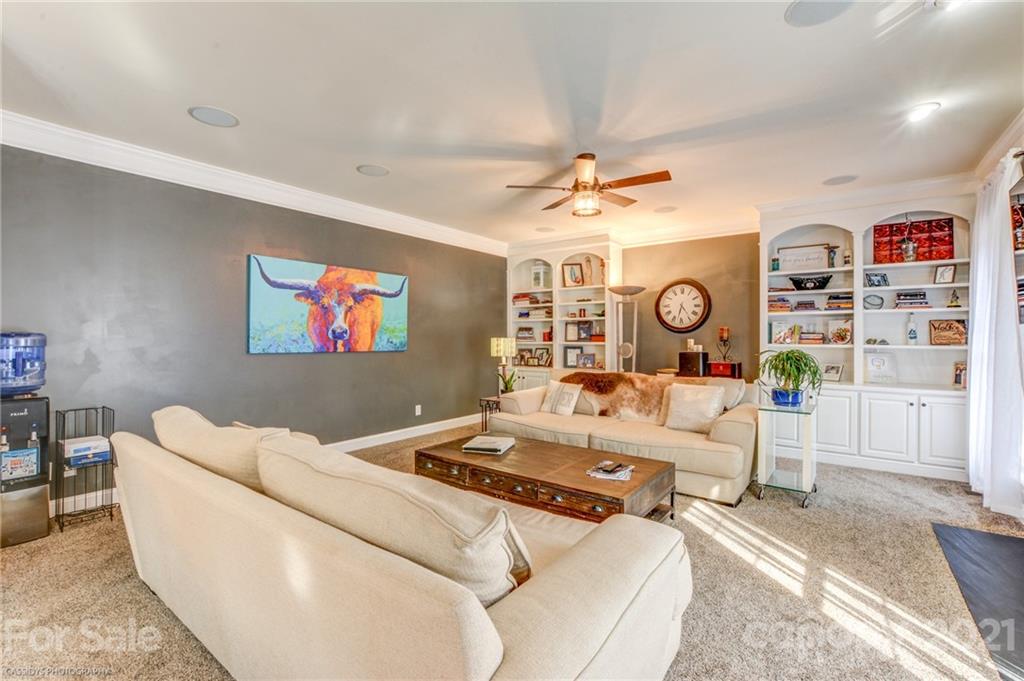 2678 Landing Pointe Drive Clover, SC 29710 - Photo 14 of 48 a living room with furniture and a clock