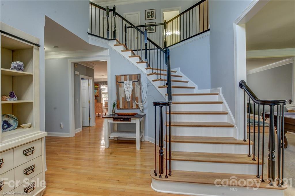 2678 Landing Pointe Drive Clover, SC 29710 - Photo 21 of 48 a view of entryway and hall with wooden floor